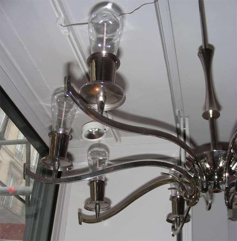 An Italian nickel-plated eight-arm chandelier For Sale 1
