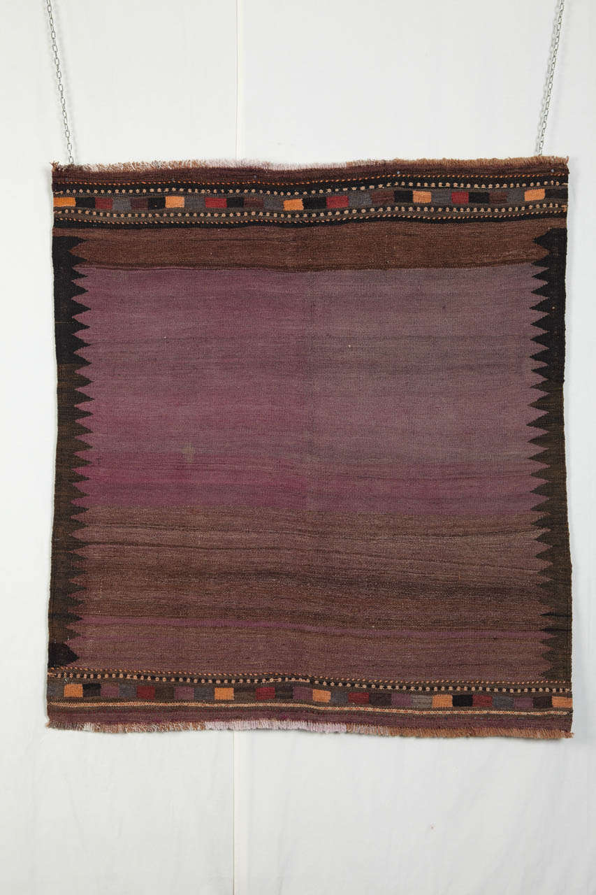 A small village flat-weave probably intended as a Sofreh: bread rug. The women of the tribal community weave these flat-weaves. They were lying on the ground to put food and bread, and they were folded to store the bread after meal.
Amazing
