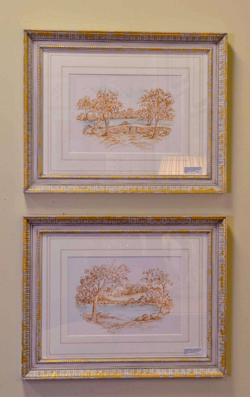 There are four original sepia and blue watercolor landscape by Dora McDaniel in this set.  They are hand painted watercolor with a French mat and beautiful hand carved and hand painted frames.