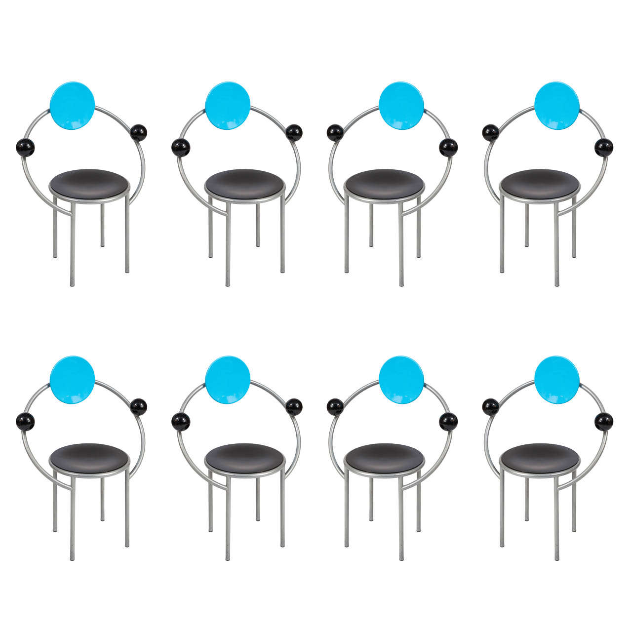 A  set of eight “First”  Memphis Chairs, designed by Michele De Lucchi.