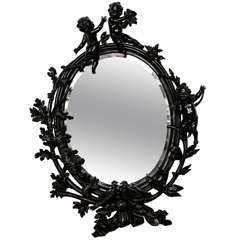 Antique Large Carved and Ebonised Walnut Mirror