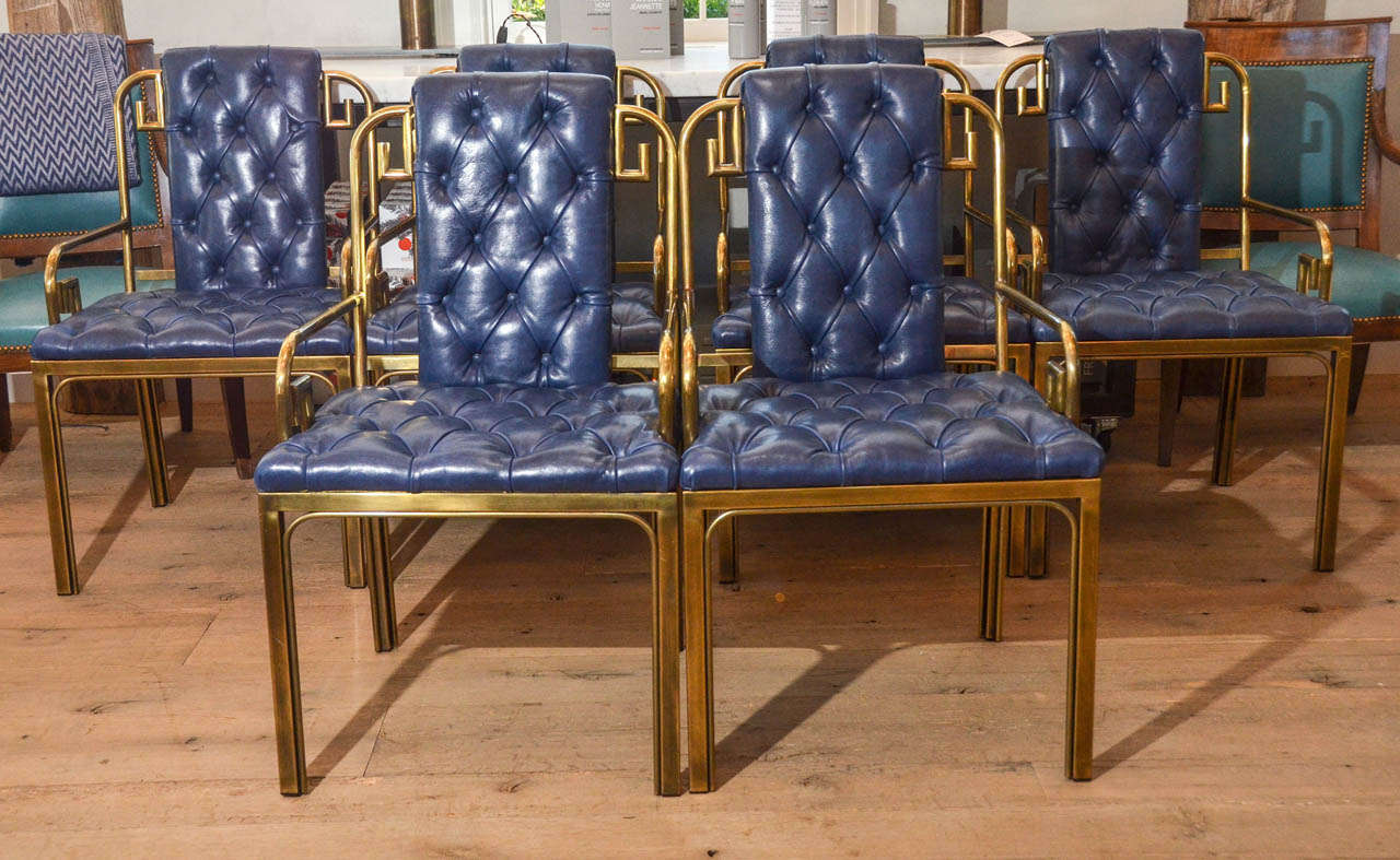 Stunning set of eight 1960's Mastercraft greek key dining chairs newly reupholstered in marine colored leather.