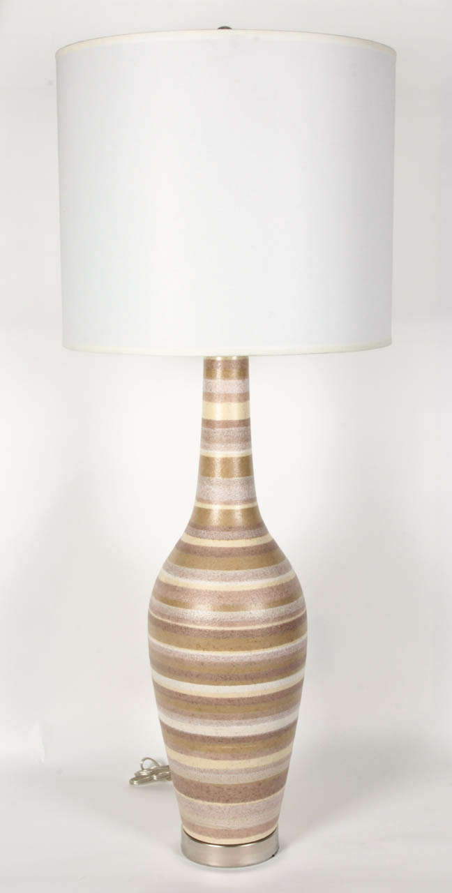 Fantastic pair of Mid-Century Modern Italian striped lamps in tones of beige, tan and grey on satin nickel bases.
