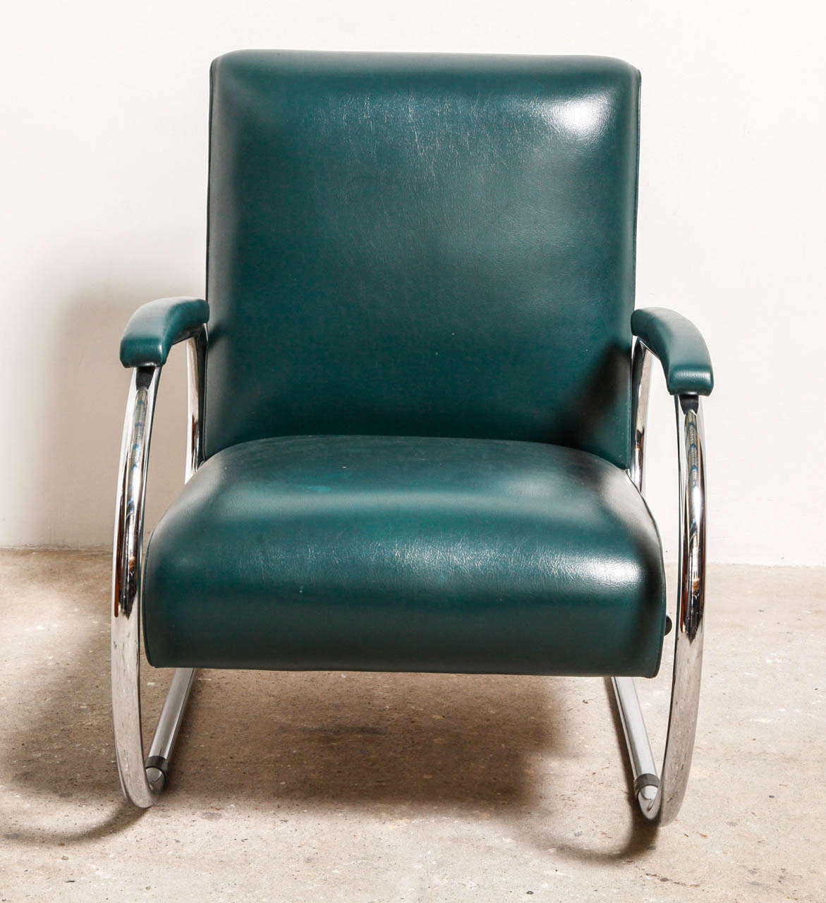 Tubax streamline chair.
Original Tubax Art Deco chair in green upholstery good condition. Rare find!