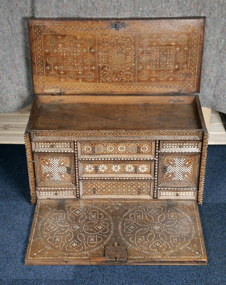 Fall-front table cabinet with intricate bone inlay geometric decoration.