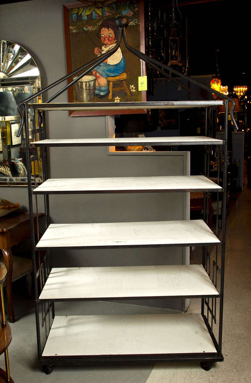 Wrought iron etagere by John Ryman.
Featured on the cover of Elle Decor December 2000!