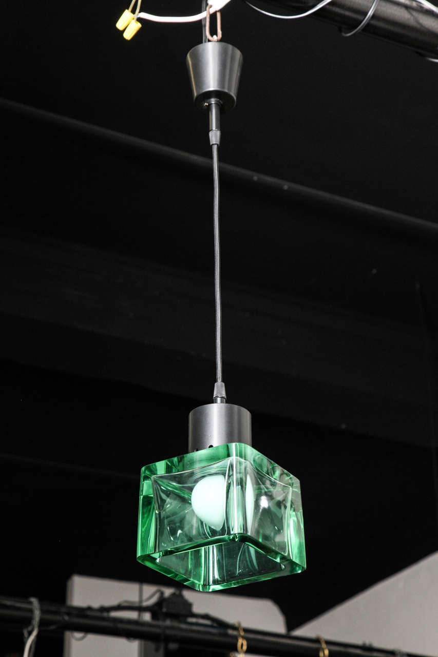 Elegant pendant light fixture made in Venice, 1960 by Seguso designed by Flavio Poli. Rich emerald-green blown glass shade with an adjustable wire, great for that small space, beautiful quality.