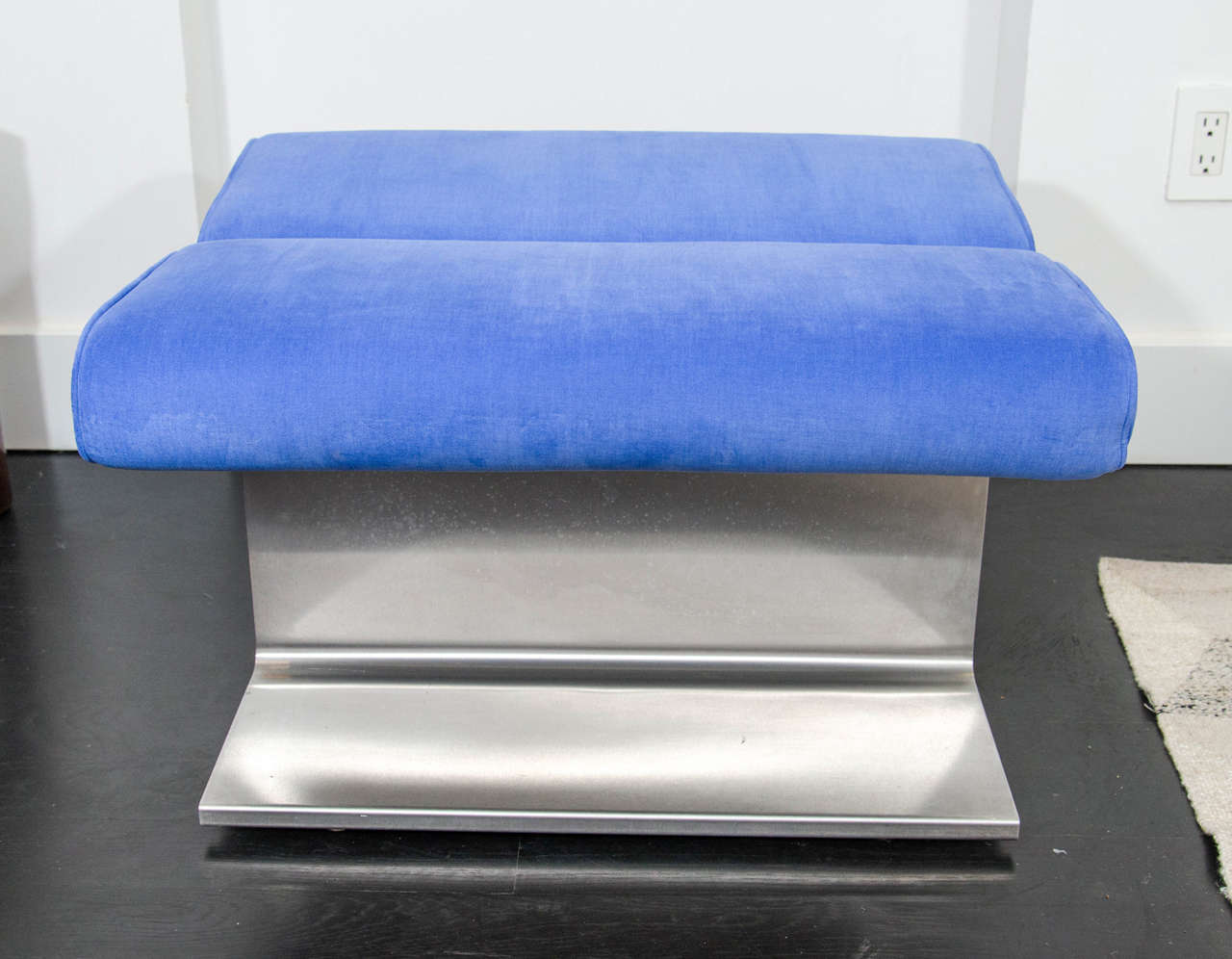 Sculptural stainless steel bench with blue upholstery. Exceptional
construction. Open to custom upholstery with COM.