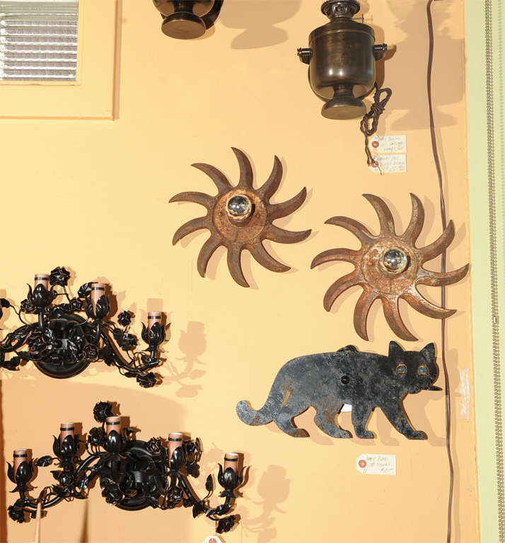 This pair of sconces were created from antique farm implements.  Great single light sconces, ready to install.  These fixtures can be UL Listed for an additional charge.