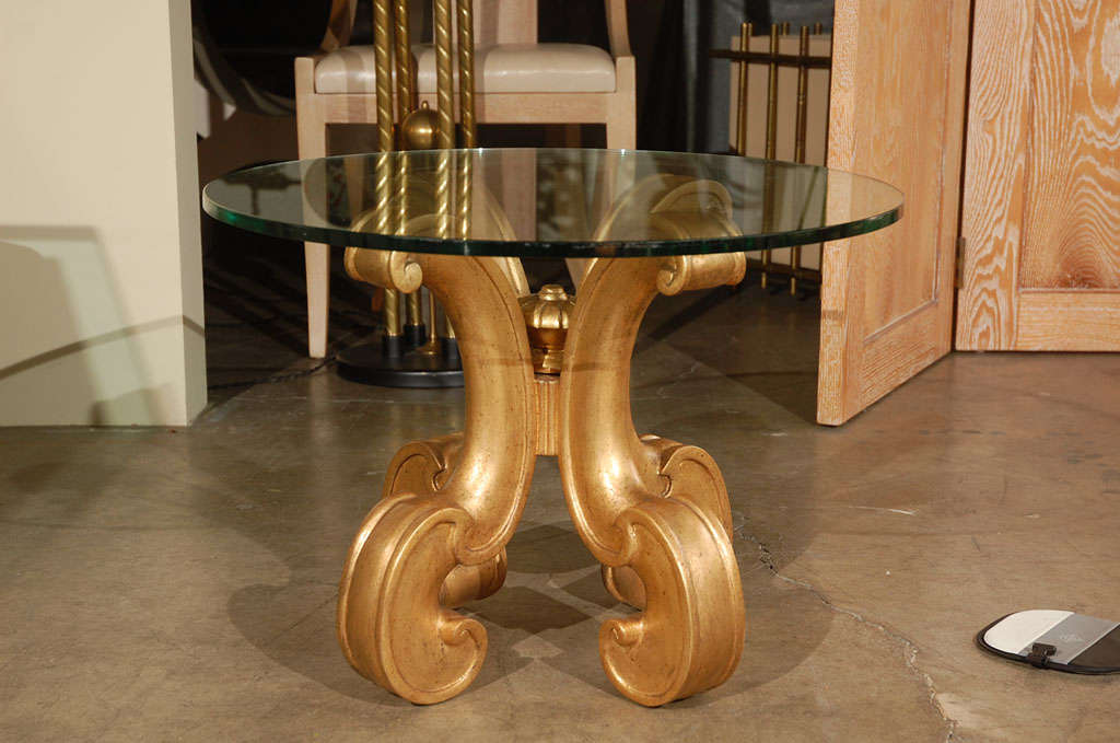 Italian carved and gilded side table base.