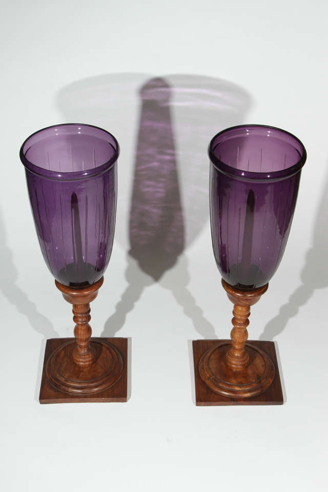 Pair of large vintage hurricanes. Purple etched glass with turned wood stands. 