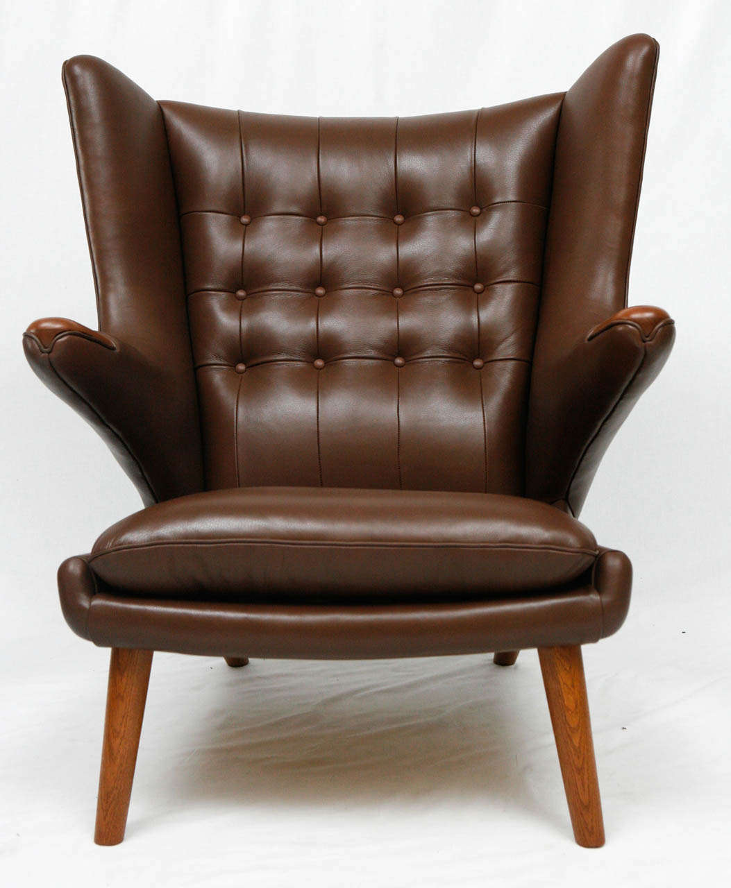 Hans Wegner papa bear chair produced by AP Stolen.    Store formerly known as ARTFUL DODGER INC