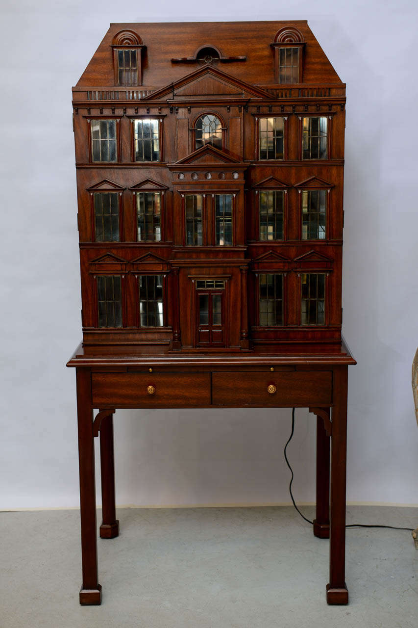 Very unusual and striking doll house bar cabinet with leaded windows.
