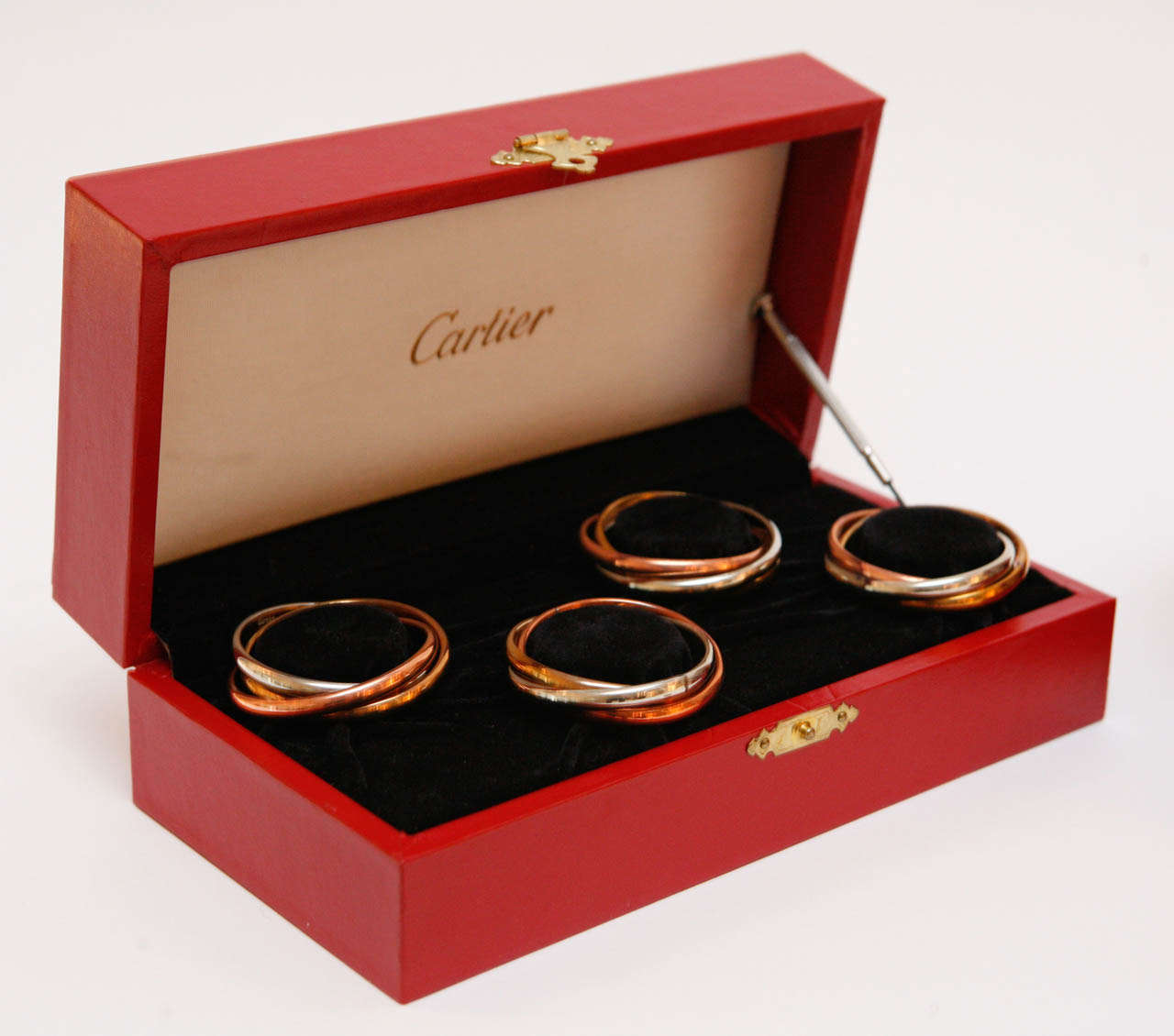 Set of Eight Trinity Napkin Rings in Original Boxes by Cartier at