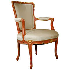 A Italian Louis XV-style, Painted Armchair with Gilt Highlights