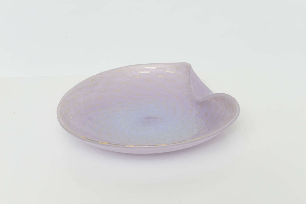 Gorgeous 1950's Barovier e Toso shallow bowl with folded rim, executed in pale lavender Murano glass with controlled bubble pattern, dusted in gold.