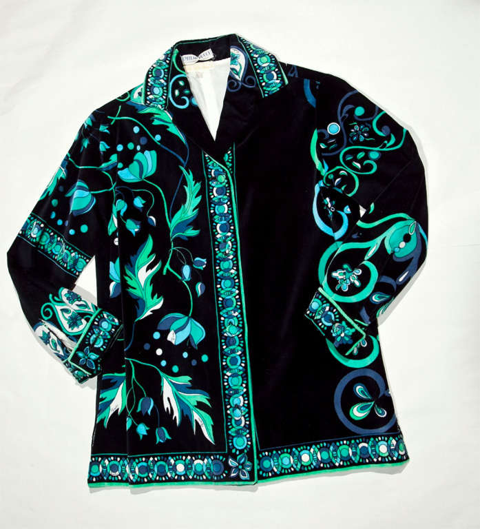 Outstanding Museum-Par Vintage Pucci Velvet Jacket featuring signature floral print, framed borders, covered buttons, hand-hemmed lining as well as original 'emilio pucci' and 'saks fifth avenue' labels. Shades of turquoise and mint green are