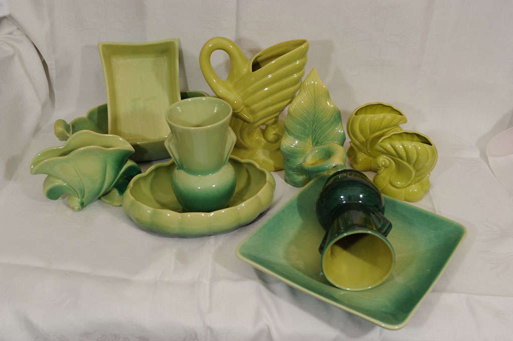 Collection of different decorative glazed dishes and objects in different shades of green. Each item has serial number at the bottom.They are highly desirable among collectors of Canadian art and Pottery.