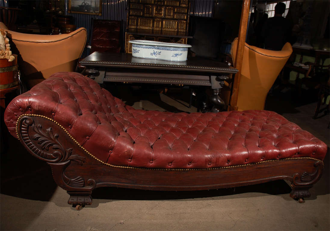 Victorian red leather upholstered chaise.