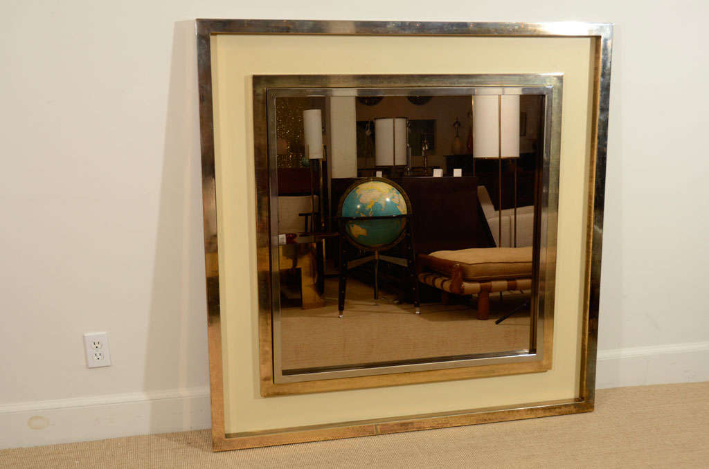 A Large Maison Jensen Brass, Glass and Chrome Mirror Frame.