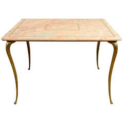 A Pink Marble and Brass Table.