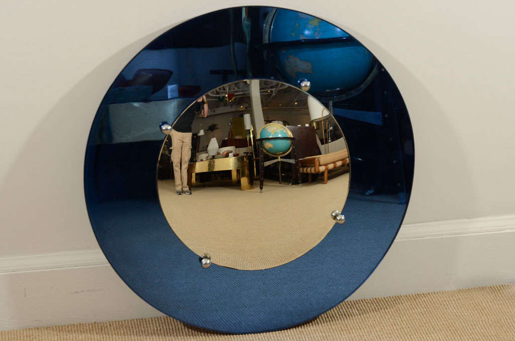 An Art Deco Style Circular Blue Wall Mirror.