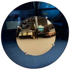 An Art Deco Style Circular Blue Wall Mirror.