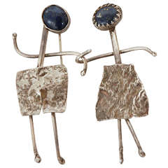 Pair of Modernist Silver and Lapiz Pins