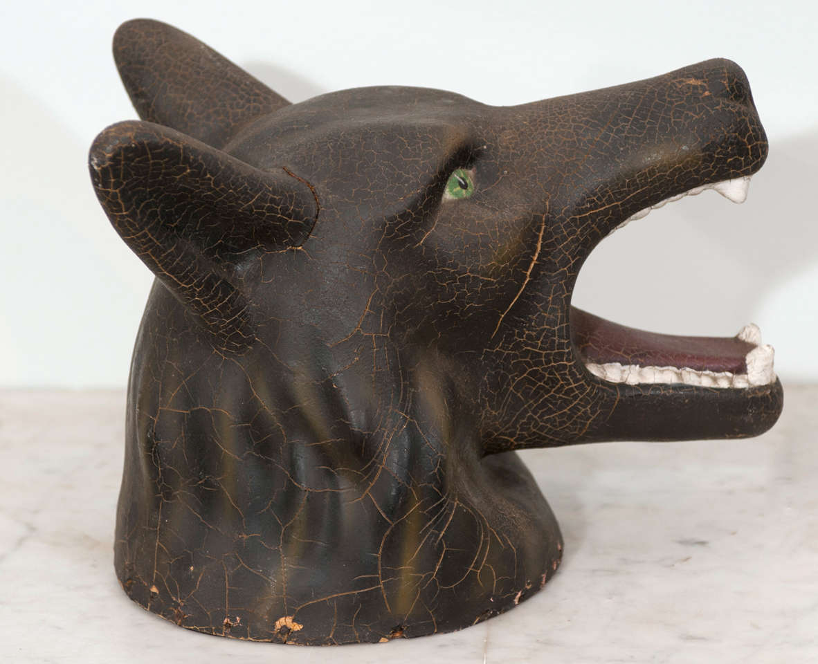 Expressive wolf totem head, likely mounted on a pole for cub scout meetings and ceremonies.