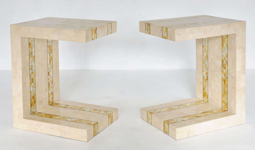 Pair tessellated stone end tables by Maitland-Smith.  Brass inlay with tessellated mother of pearl detailing.  Made in Philippines in factory along side Karl Springer designs.