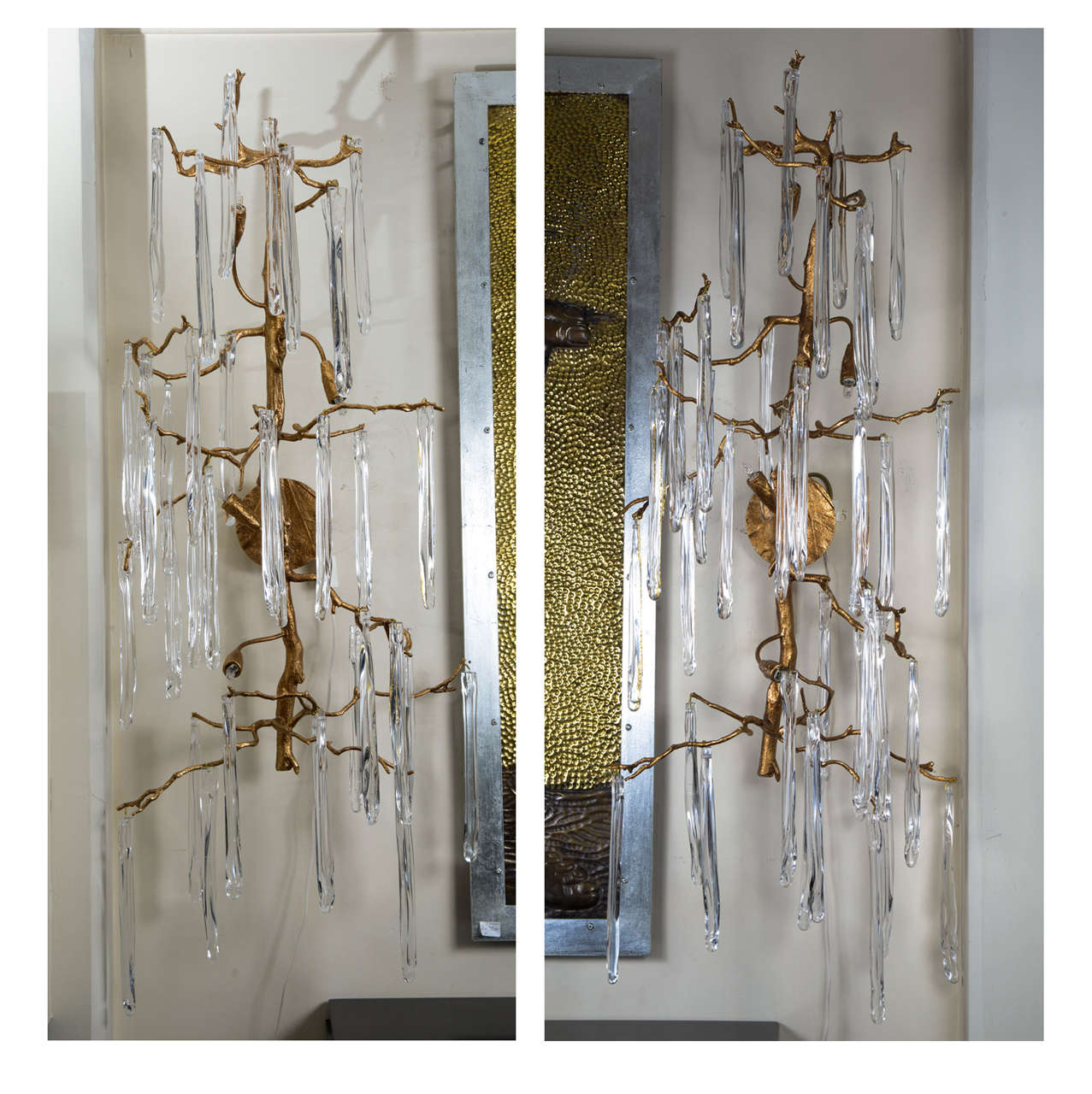 Pair of very big sconces, crystal pendants, sculpted bronze with gold
patina.