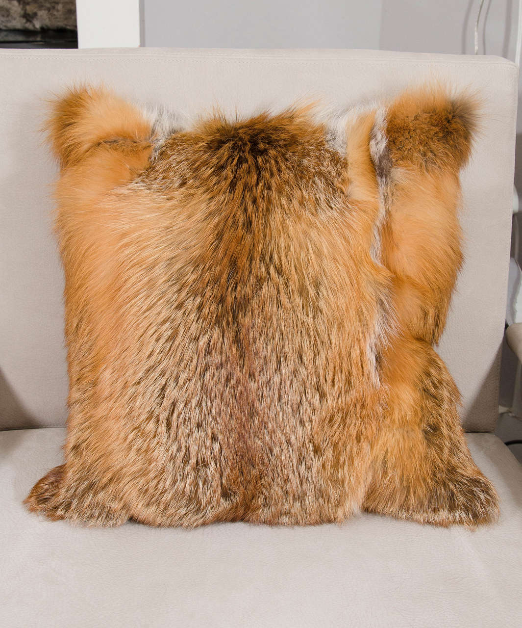 Red fox pillow with camel cashmere backing.