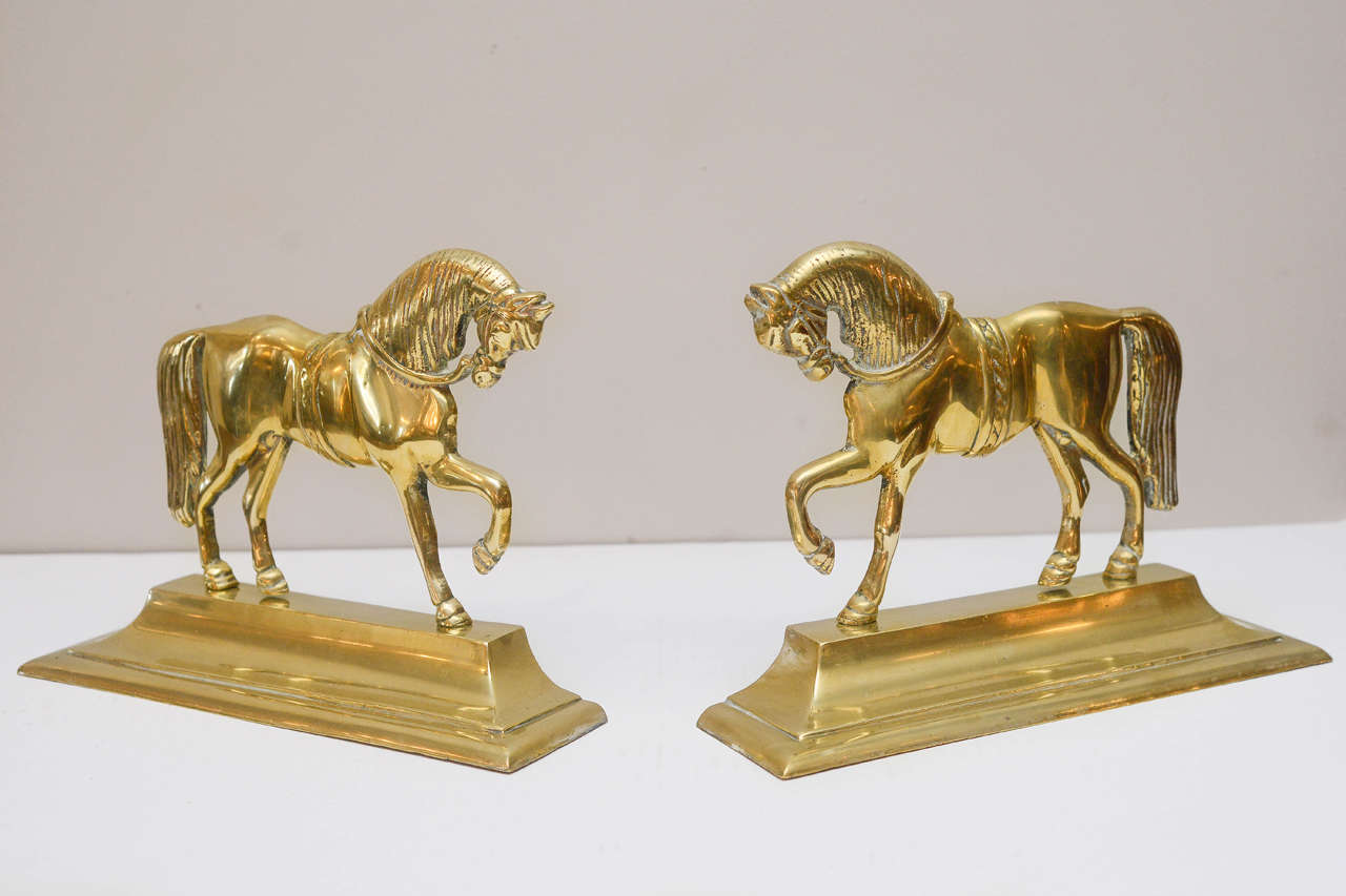 Pair of English brass horse form doorstops, 19th century.