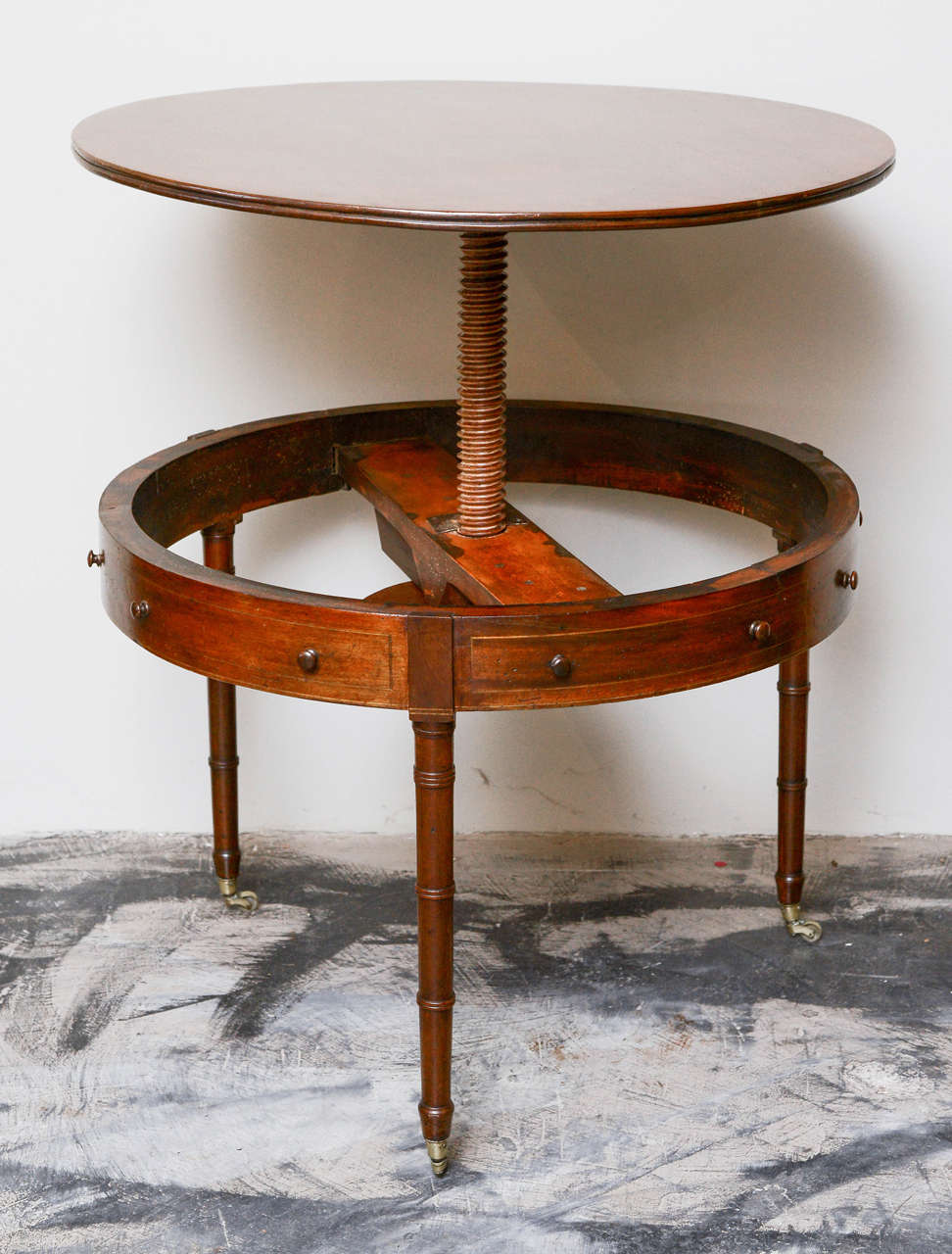 English Style Mahogany Adjustable Mechanical Wine Tasting Table, Circa 1840, with string inlay and faux drawer front decoration.