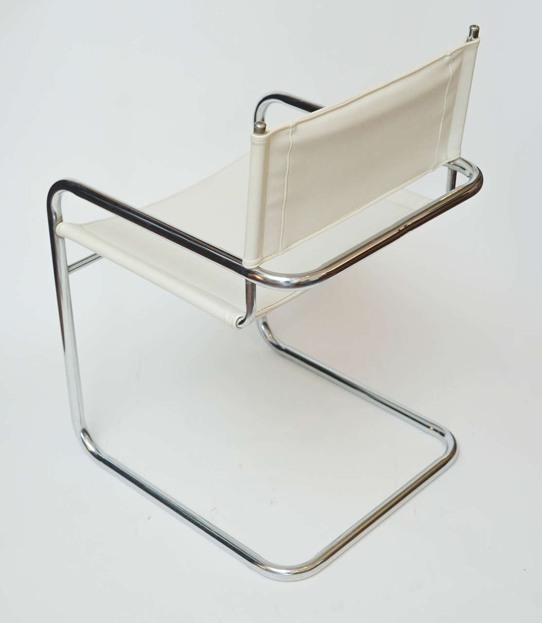 Faux Leather Set of Four Midcentury Chrome and White Pleather Chairs