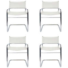 Set of Four Midcentury Chrome and White Pleather Chairs