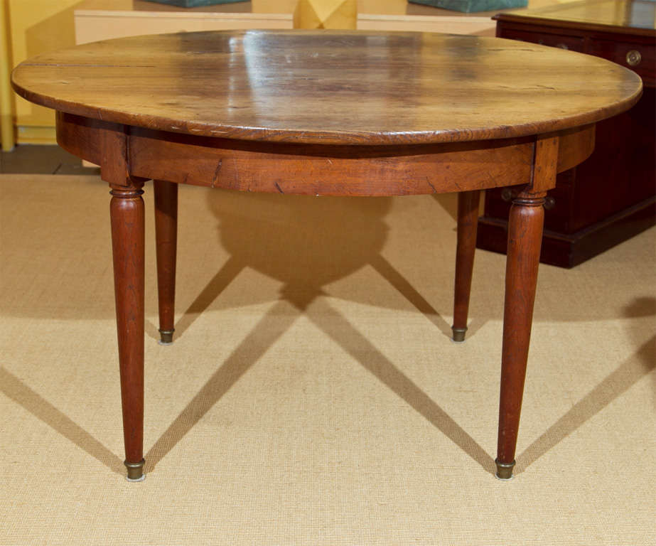 Rustic Round Extension Table with two leaves added as needed