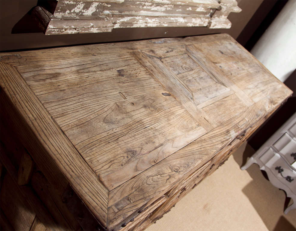 Offered here is a great storage chest, apothecary or dresser from Indonesia with 14 drawers that can be accessed from either side.  Great for in the center of a room - old iron strapping...
