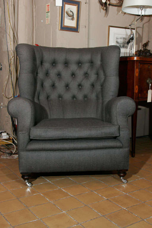 A pair of large wing back armchairs For Sale 2