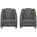 A pair of art deco cloud back armchairs