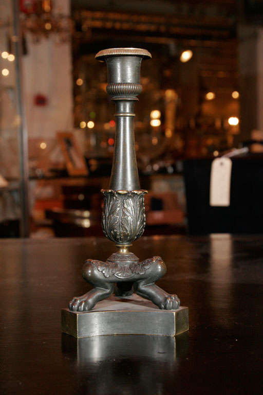 British A pair of Regency bronze candlesticks For Sale