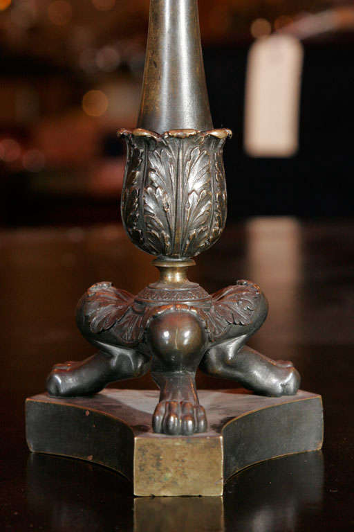 19th Century A pair of Regency bronze candlesticks For Sale