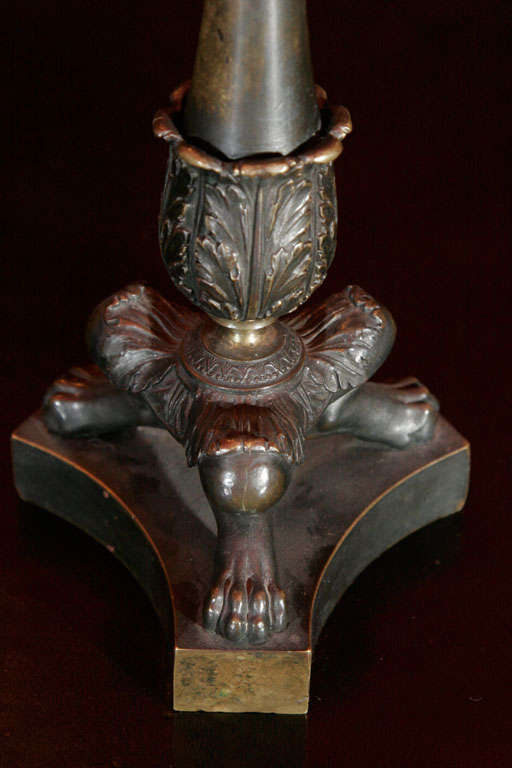 A pair of Regency bronze candlesticks For Sale 1