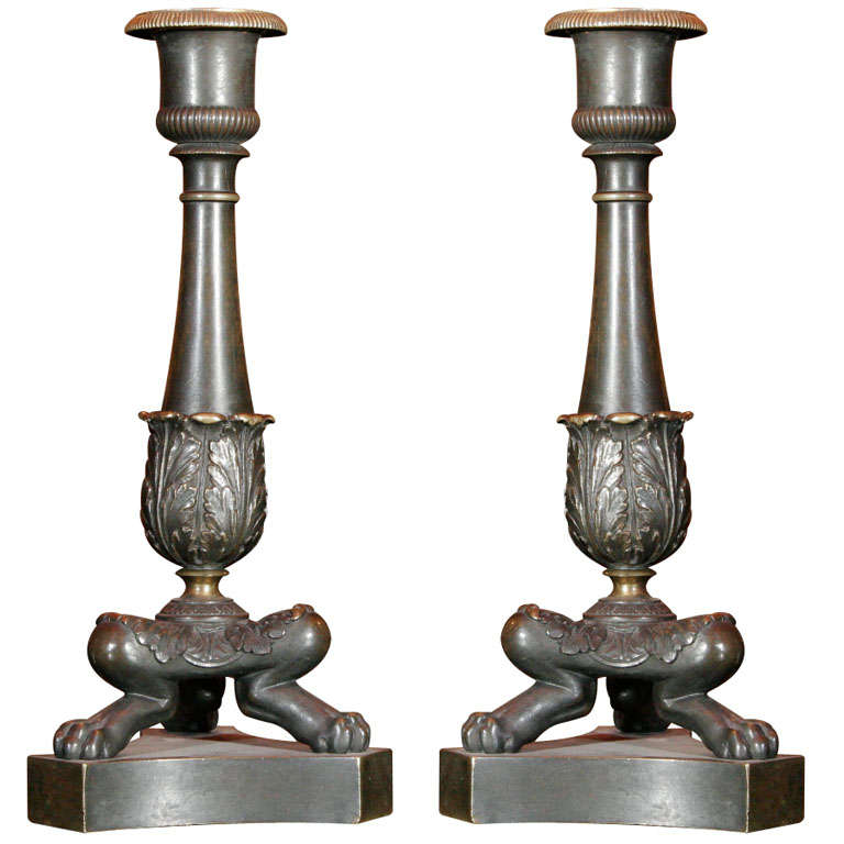 A pair of Regency bronze candlesticks For Sale