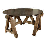 Reception table with large scale timber base and stone top