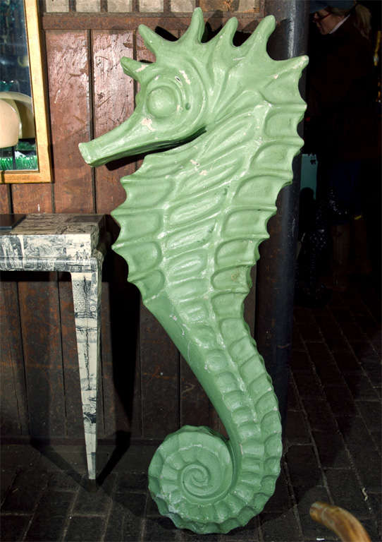 A wonderful pair of large seahorses waiting for a home. They are made of fiberglass.
