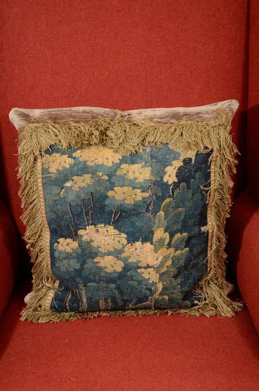 Single Dutch tapestry fragment made into a cushion with silk velvet backing and <br />
fringe