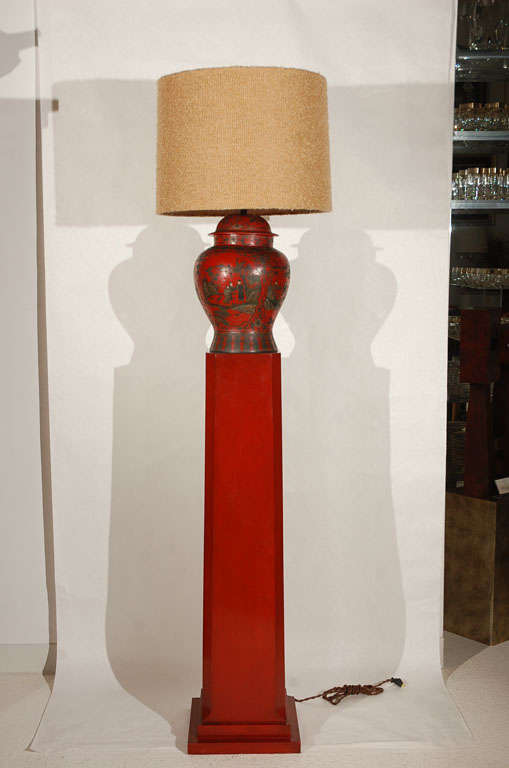 A beautiful pair of custom floor lamps designed by Billy Haines consisting of a pair of Chinese  Papier mache lidded urns placed on lacquered square columns.  The shades are remade on the original frames in a stylish nubby wool.  These lamps are