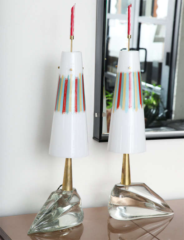 Extraordinary pair of table lamps designed by Roberto Giulio Rida, made in 2000 in Milan. Shades are in blown venation glass with a design of colored glass rods inlaid into the white glass. Base is a clear piece of molded glass. Signed on the brass.