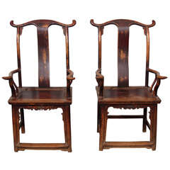 Pair of Chinese Carved Yolk Back Arm Chairs